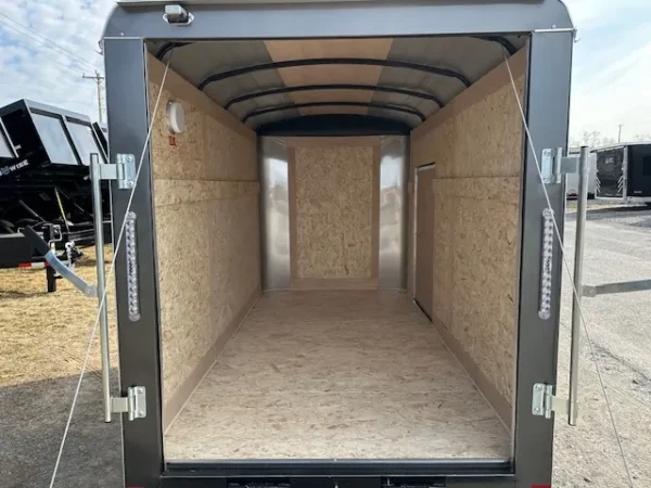 2025-5X10-CARRY-ON-CARGO-TRAILER-RAMP-DOOR-DING-AND-DENT-7-1.webp Ding and Dent Carry-On 5 x 10 Enclosed Cargo Trailer Ramp Door