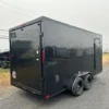 2025-HOMESTEADER-ENCLOSED-CARGO-TRAILER-RAMP-DOOR-ADDED-HEIGHT-BLACK-TRIM-2.webp Homesteader 7 x 16 V-Nose Enclosed Cargo Trailer