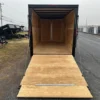 2025-HOMESTEADER-ENCLOSED-CARGO-TRAILER-RAMP-DOOR-ADDED-HEIGHT-BLACK-TRIM-5-1.webp Homesteader 7 x 16 V-Nose Enclosed Cargo Trailer