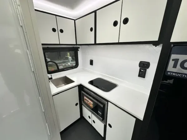 ATC-7.5-x-20-Aluminum-Toy-Hauler-Above-Beyond-Package-Energy-Package-Living-Quarters-14.webp ATC 7.5 x 20 Aluminum Travel Trailer Toy Hauler