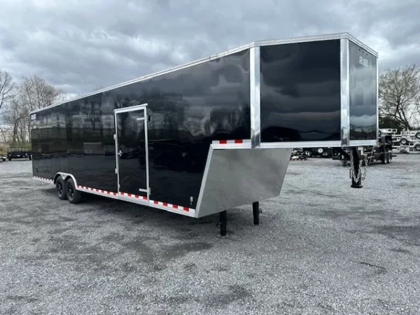 Car-Mate-8.5-x-38-Gooseneck-Enclosed-Cargo-Trailer-Rear-Ramp-Door-Car-Hauler-Get-Out-Door-Aluminum-Wheels-4.webp Car Mate 8.5 x 38 Enclosed Gooseneck Trailer Aluminum Wheels